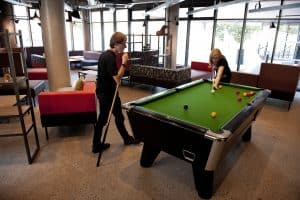 students playing pool