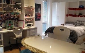 bedroom with christmas decorations hanging up