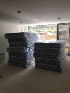 stack of new mattresses