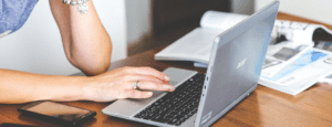 Close-up-of-woman-typing-on-keyboard-of-laptop