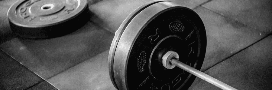 Grayscale-Photo-of-Black-Adjustable-Barbell