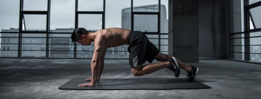 Man-Doing-Host-Alphabet-Workout