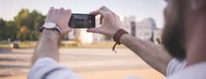 man-taking-photo-of-landscape