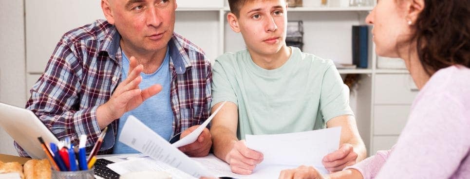 student with parents
