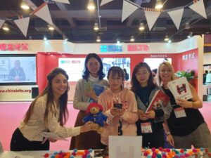 students at host stand China Education Expo CEE